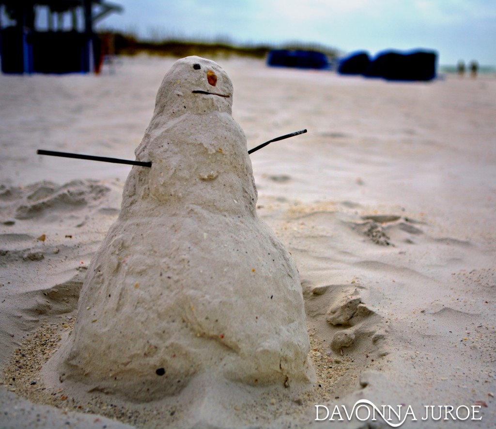 White sand beach snowman